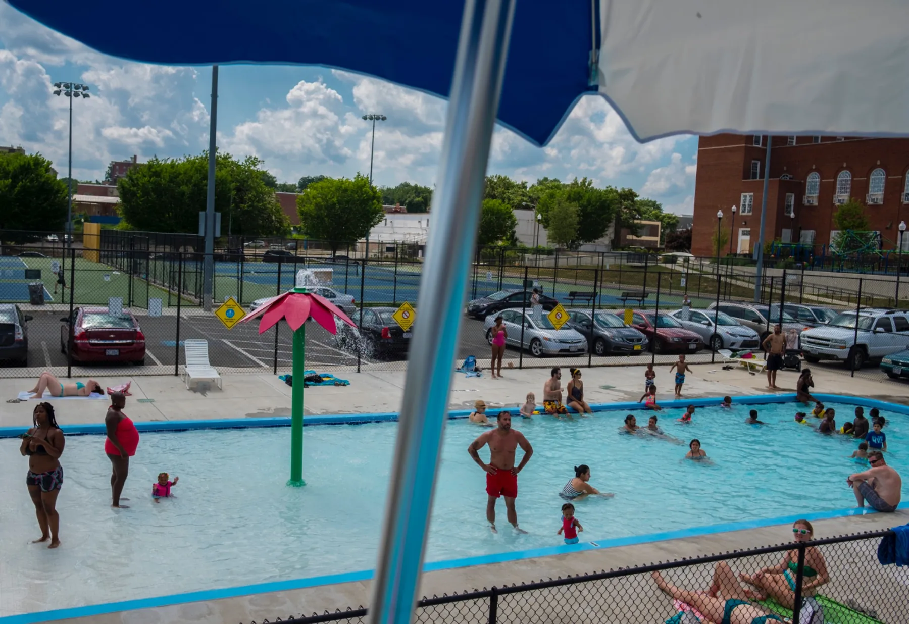 Families enjoying the splash pool