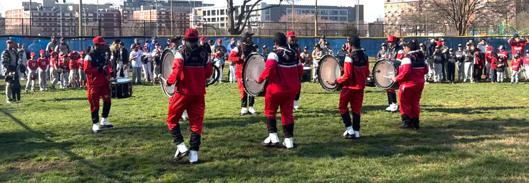 Drumline performing at a community event